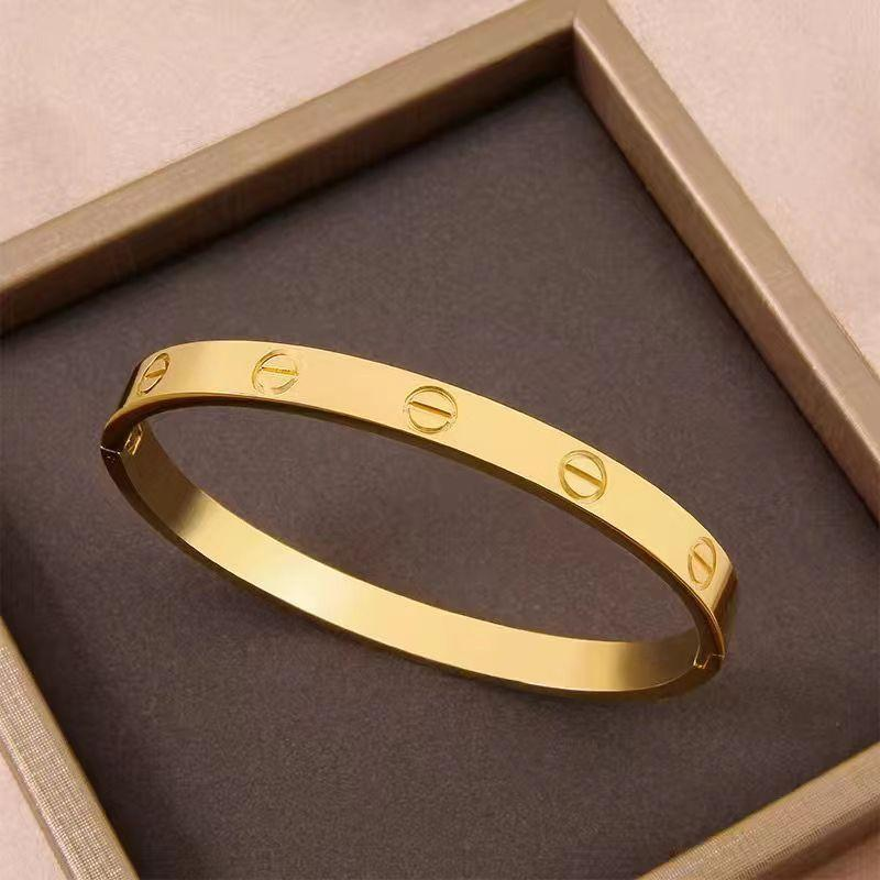 Bangle in acciaio inox con profilo lucido